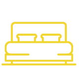 Yellow outline icon of a bed with two pillows, viewed from the front.